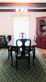 Kincaid Cherry Dining Table and chairs, along with a server. 