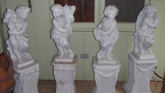 Four Seasons Statues on pedestal