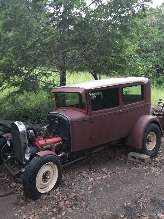 1930 Ford model A Steel ‘Tudor’ body stlye
‘Project Car’    Car has not been run in 14 years.  Does not currently run.  Car body in good shape.   Chevy 327 engine, big wheels on back.  Front wheels have ‘articulating fenders’.