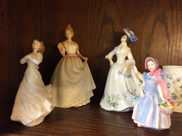 4 Royal Doulton 'fancy ladies'.