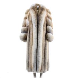 "Golden Island" Red Fox Fur Ankle Length Coat: A Golden Island red fox fur ankle length coat. This full fur coat features vertical panels, paneled sleeves, large collar, two outer pockets, and three hook and eye closures with a fourth closure to layer.