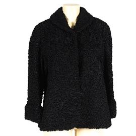 Curly Lamb Fur Jacket by Davidson's: A curly lamb fur jacket by Davidson’s of Indiana. This jacket features black curly lamb fur, convertible rolled sleeves, two outer pockets, and a double hook and eye closure.