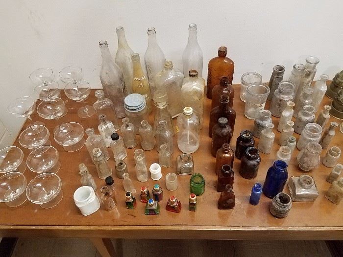 Antique bottles and more glassware
