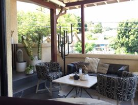 Patio furnishings, lighting, travertine coffee table