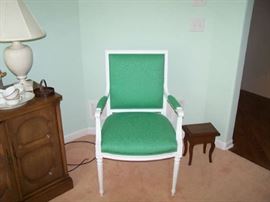 ONE OF A PAIR OF OPEN ARMCHAIRS