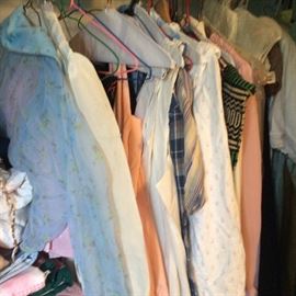 Closet full of antique and vintage clothing