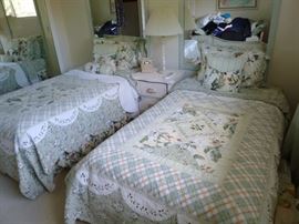 The nice bedding on the twin beds