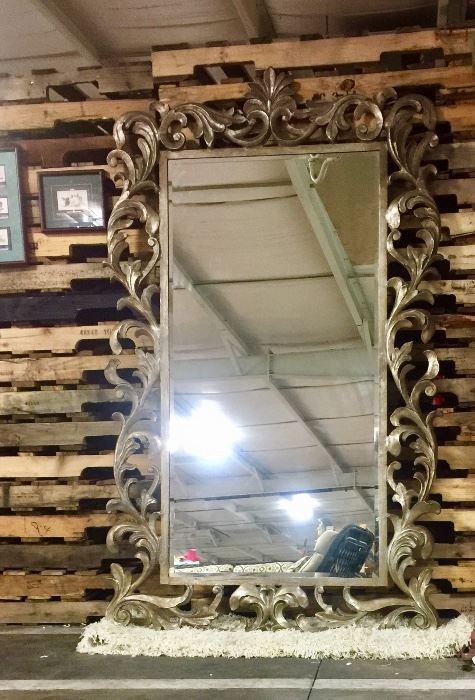 Uttermost Molise mirror. This mirror can be hung or stand on frame. Frame is metal. In excellent condition. 