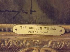 The "Golden Woman" by PIERRE PUYET Jose Puyet (April 22, 1922 – August 28, 2004). 
The full name of the artist was Jose Puyet Padilla. 