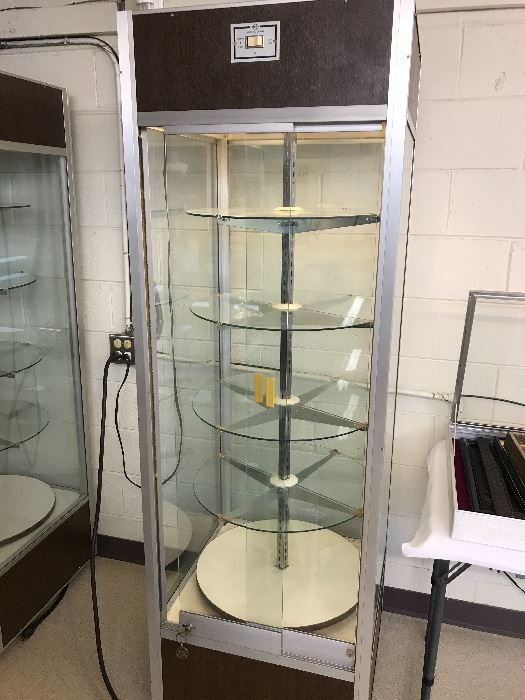 Display case with lights and rotates