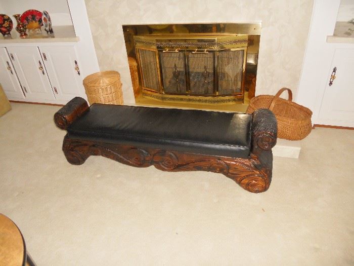Witco carved Tiki jungle style bench--this piece made famous by its relationship to the furnishings in Elvis Presley's Jungle room collection at Graceland