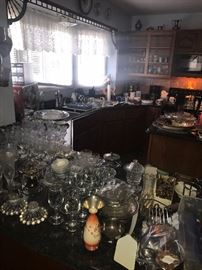 TONS OF KITCHENWARE, GLASSWARE, COOPER POTS, SILVERWARE, CHINA SETS, COOKWARE, BAKEWARE AND SMALL APPLIANCES