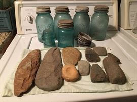 Collectible blue jars and Indian artifacts
