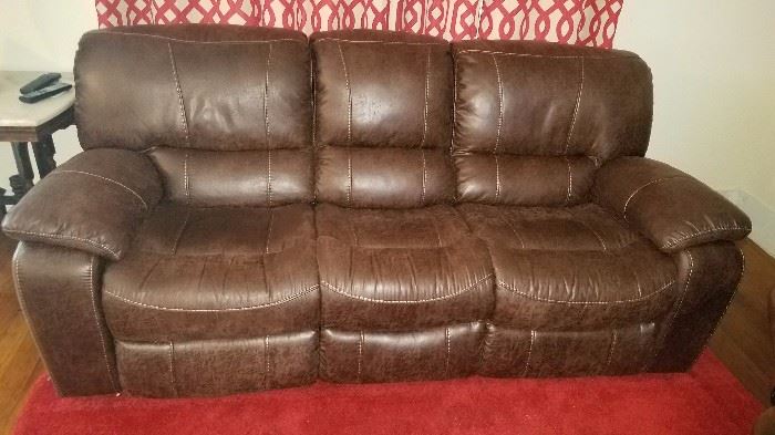Like new leather couch w electric double recliner