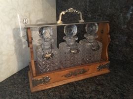 Rare Oak & Sterling Victorian Betjemanns Patent London Tantalus w/hobnail cut glass decanters. Circa. 1890.