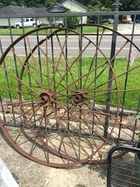 Huge Iron Wagon Wheels and Smaller Ones