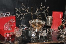 Phenomenal Baccarat crystal animal paperweight collection as well as silver plate and sterling silver serving pieces