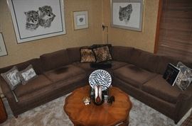 Fabulous brown chenille three piece sectional. 27"H x 36"D x 110"L (on each leg of the L).  Shown with pillows from Neiman Marcus.