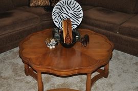 40" round scalloped walnut coffee table by John Widdicomb.  17" high