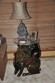 Great leopard and cheetah decor atop this fantastic cheetah table!!