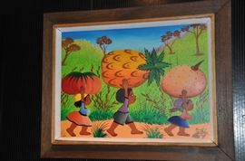 Selection of fun and colorful framed Haitian art