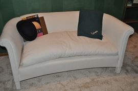 White canvas upholstered love seat with loose down cushion  26"H x 59"W x 32"D