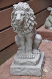Outdoor cement lion figurine
