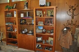 Fantastic set of two teak five shelf bookcases from House of Denmark (72"H x 32"W x 12"D) shown with a third bookcase shown in the center with three shelves and closed cabinet (69"H x 32"W x 12"D).  
