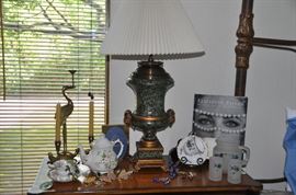 Wonderful porcelain and glass collection.  Shown with a Wildwood table lamp.