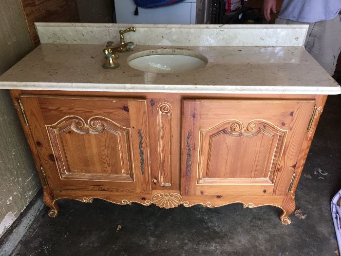 Antique vanity and sink with footed legs