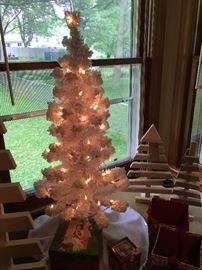 Lighted white flocked tree- table top. 