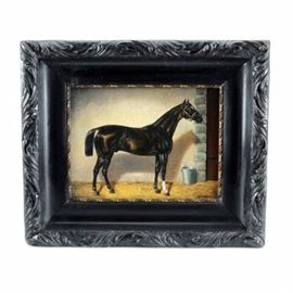 Nadler Signed Original Equine Oil Portrait on Wood Panel: An original equine oil portrait painting on wood panel signed in paint to the lower right by artist Nadler. The image depicts a beautiful black stallion with a white spot on his forehead, standing in a hay-filled stall, next to a metal pail. This painting is mounted in a wood frame with coving and a black finish, equipped to hang.