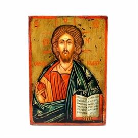 Antique Byzantine Tempera and Gold Leaf Religious Icon on Wood Panel of Christ Pantocrator: An antique Byzantine tempera and gold leaf religious icon on wood panel, depicting the Christ Pantocrator image. This image, probably the most commonly used depiction of Christ, depicts Christ encircled by a golden halo, holding the open New Testament in his left hand and gesturing a sign of blessing with his right. This piece is not framed or equipped for hanging.