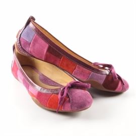 Coach Jenilee Suede Ballet Flats: A pair of Coach flats. These suede ballets flats are the Jenilee model made from multi-colored suede. There is a number “Q021 F 2070/ G05 Made in China” on the interior.