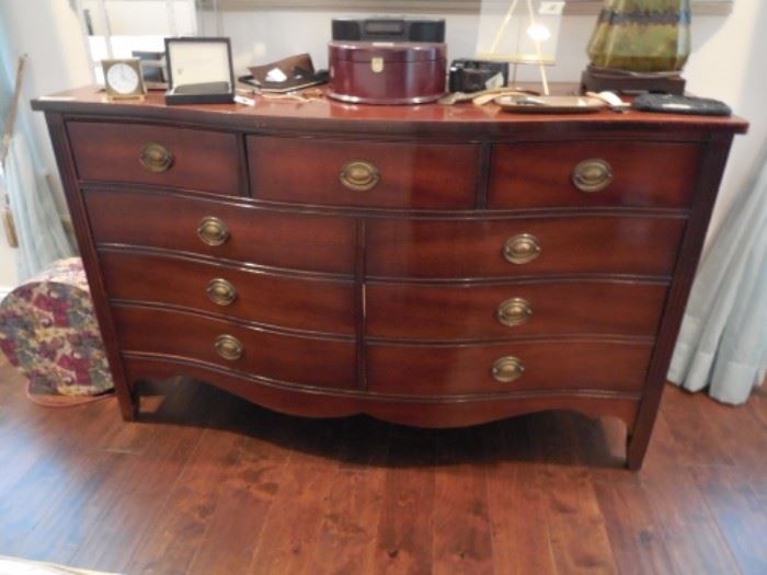 Bow front dresser