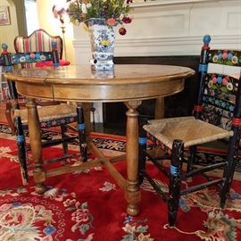 Round table with parquet inlaid top.  Pair of paint decorated chairs