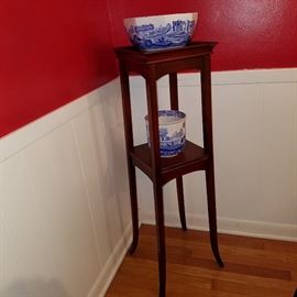 Stand displaying two Spode pieces