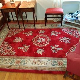 Red Chinese area rug, approximately 6' x 9'.  Pair of mahogany finish drop leaf lamp tables.