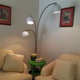 Funky floor lamp, wicker table, etc.