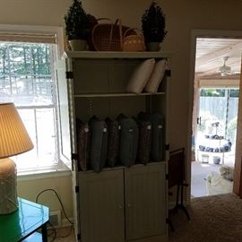 Cabinet display decorative items, pillows, etc.