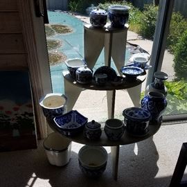 Pot stand and pots of various sizes and shapes, but all in blue & white