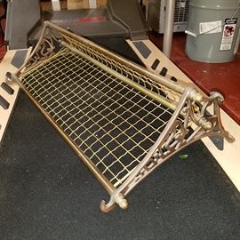 Cool rack/shelf.  Appears to be from a train