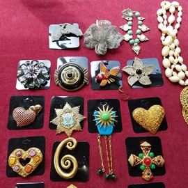 Costume jewelry pins (some shown in previous photo).  Pins by G. Yosca, Swarovski, etc.