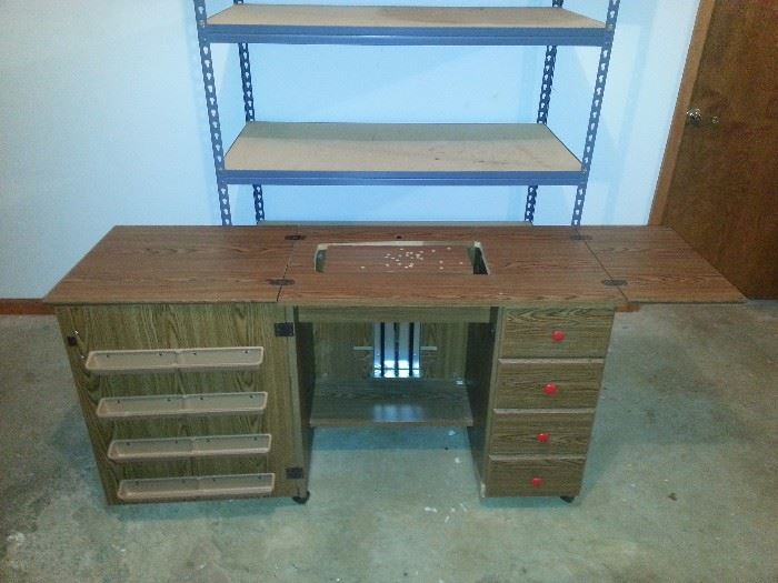 Sewing Cabinet with lift.  Great condition.  $75.00