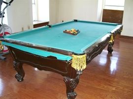 Brunswick Orleans pool table - slate top - $500 takes it along with balls and cue sticks.  You must engage a professional to move and disassemble.