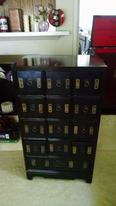 cabinet with lots of small drawers 150