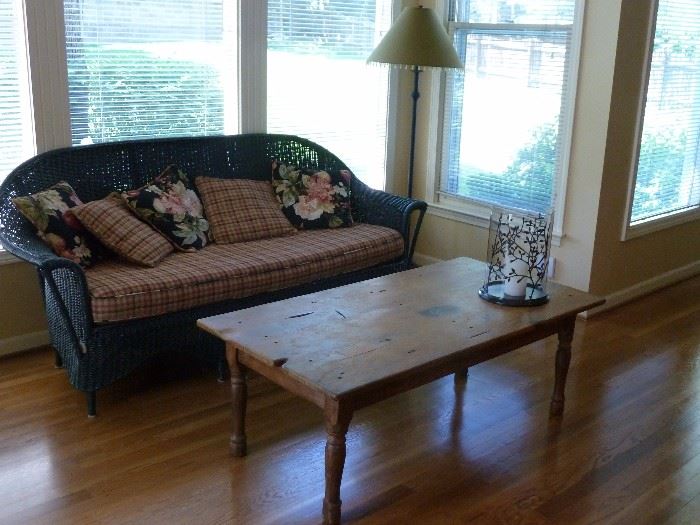 Wicker sofa w/matching wicker in garage to be uncovered(pics to come)Coffee table not for sale