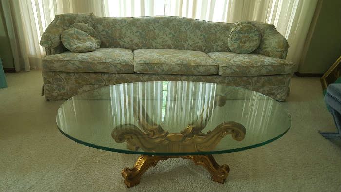 Oval glass table with brass base - $100