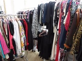Racks of women's clothing - designer names, most new tags.