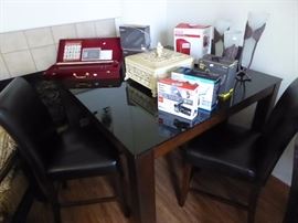 one of two tall tables and chairs set